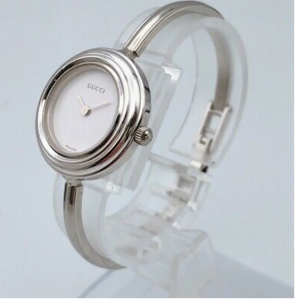 Gucci Silver Bracelet Watch with all bezels shown